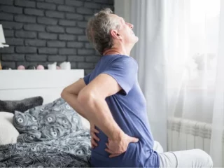 Tips To Avoid Waking Up With Joint Stiffness And Lower Back Pain